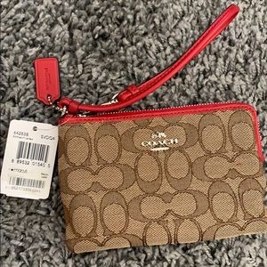 Signature Coach Wristlet